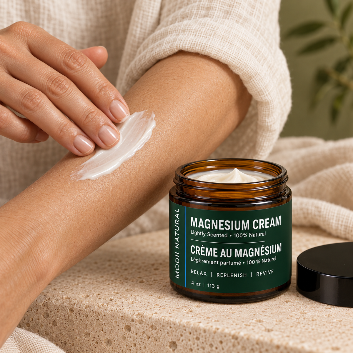MODII Natural Magnesium Body Cream, Lemongrass - 113g — adult demonstrating application to skin