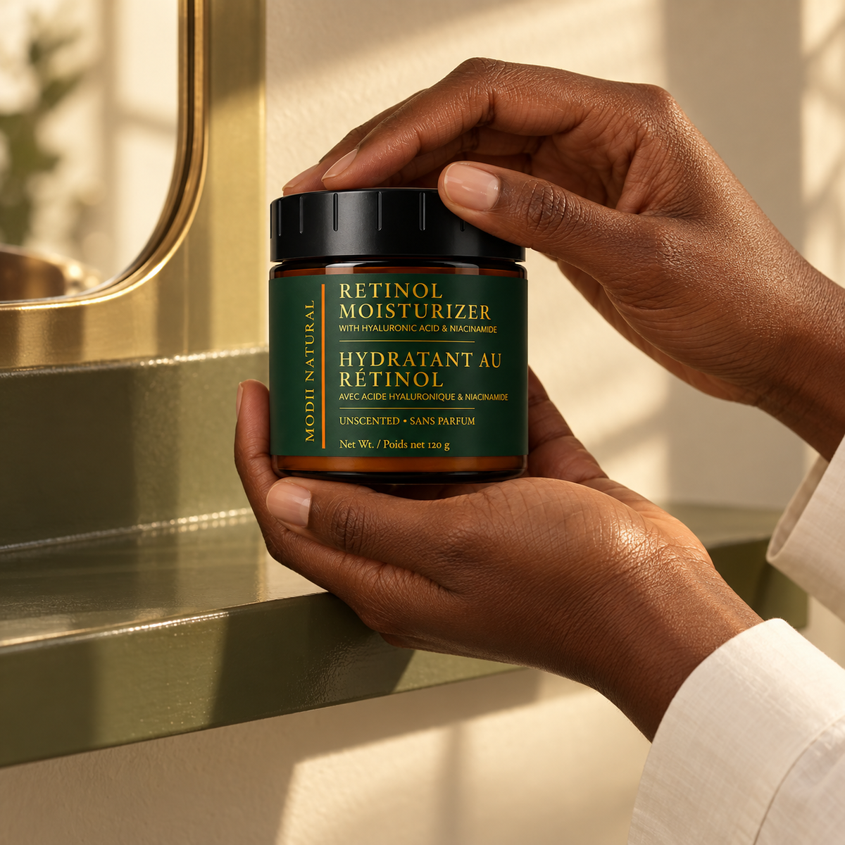 MODII Natural Retinol Face Moisturizer - 120g — product shown in adult hands for scale