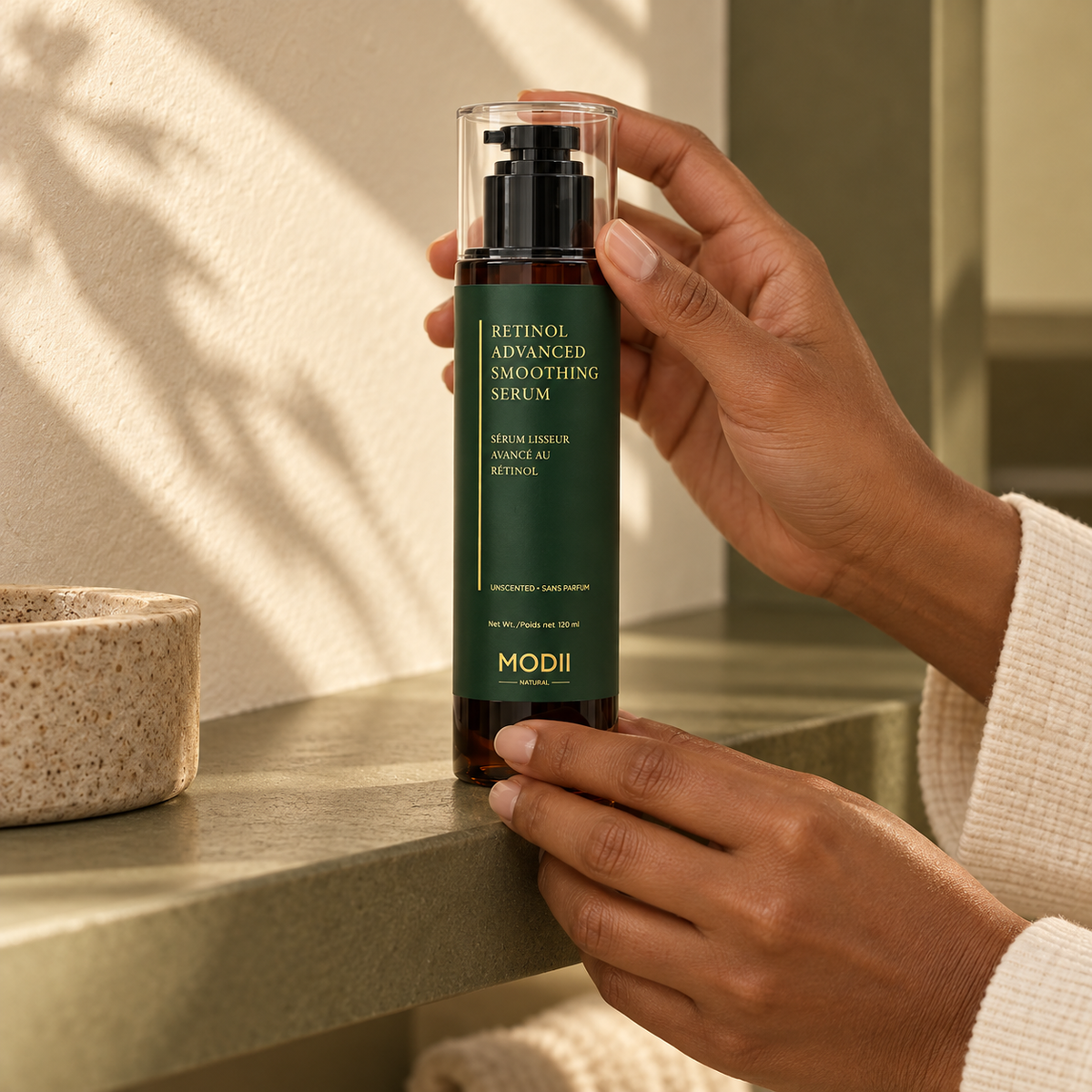 MODII Natural Retinol Advanced Smoothing Serum - 120ml — product shown in adult hands for scale